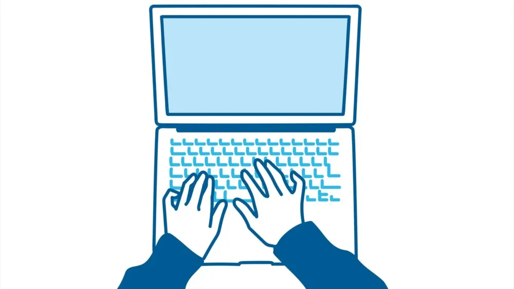 パソコン操作をしている手元